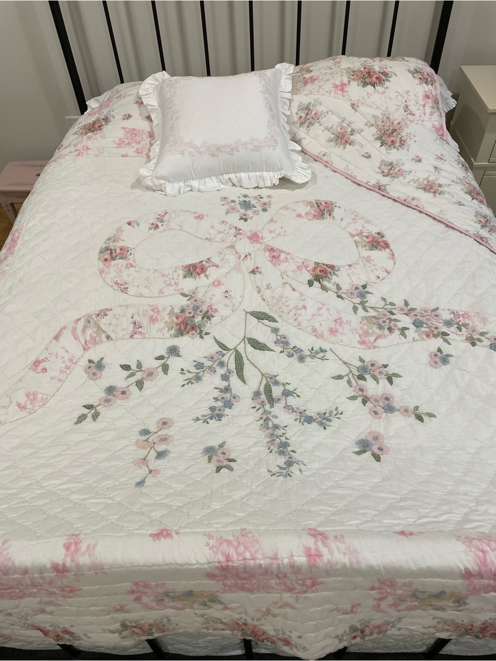 White Quilted Floral Bedspread with Pink and Green Accents